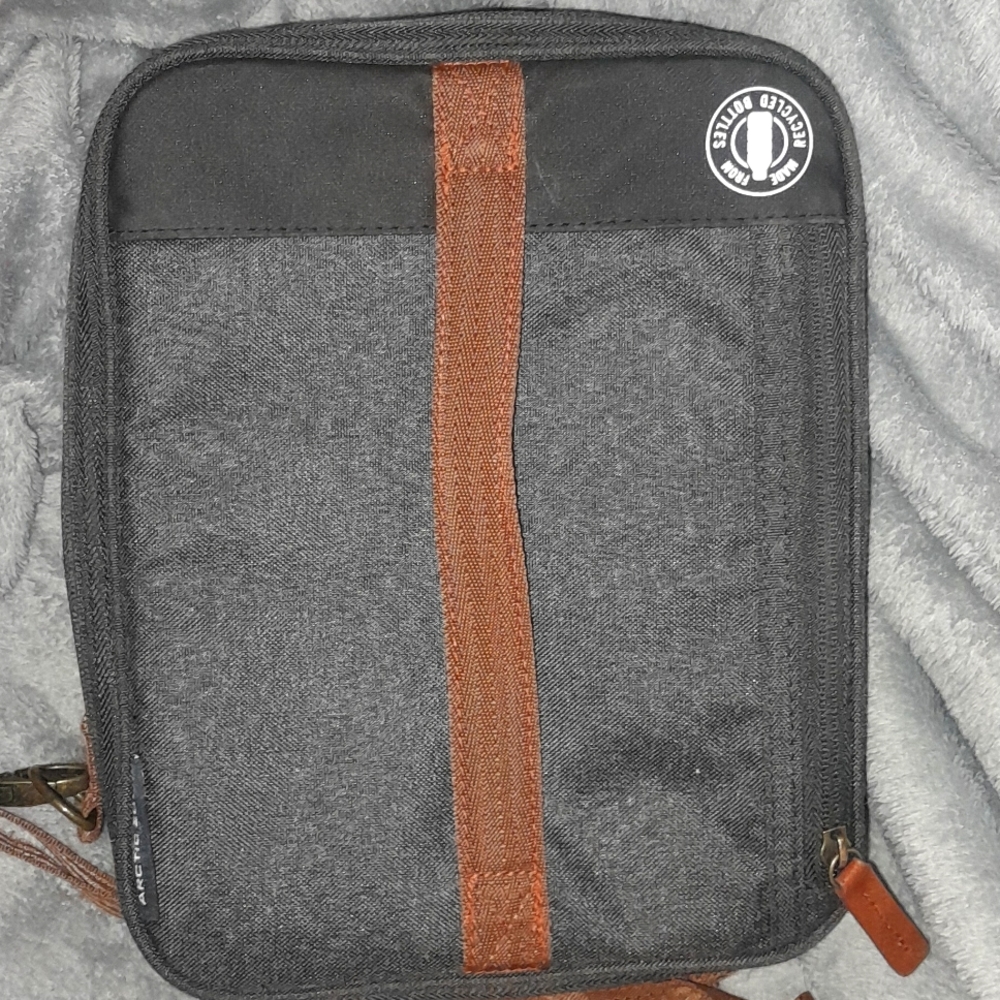 ARCTIC ZONE lunchbox, the color is a dark Grey with some brown